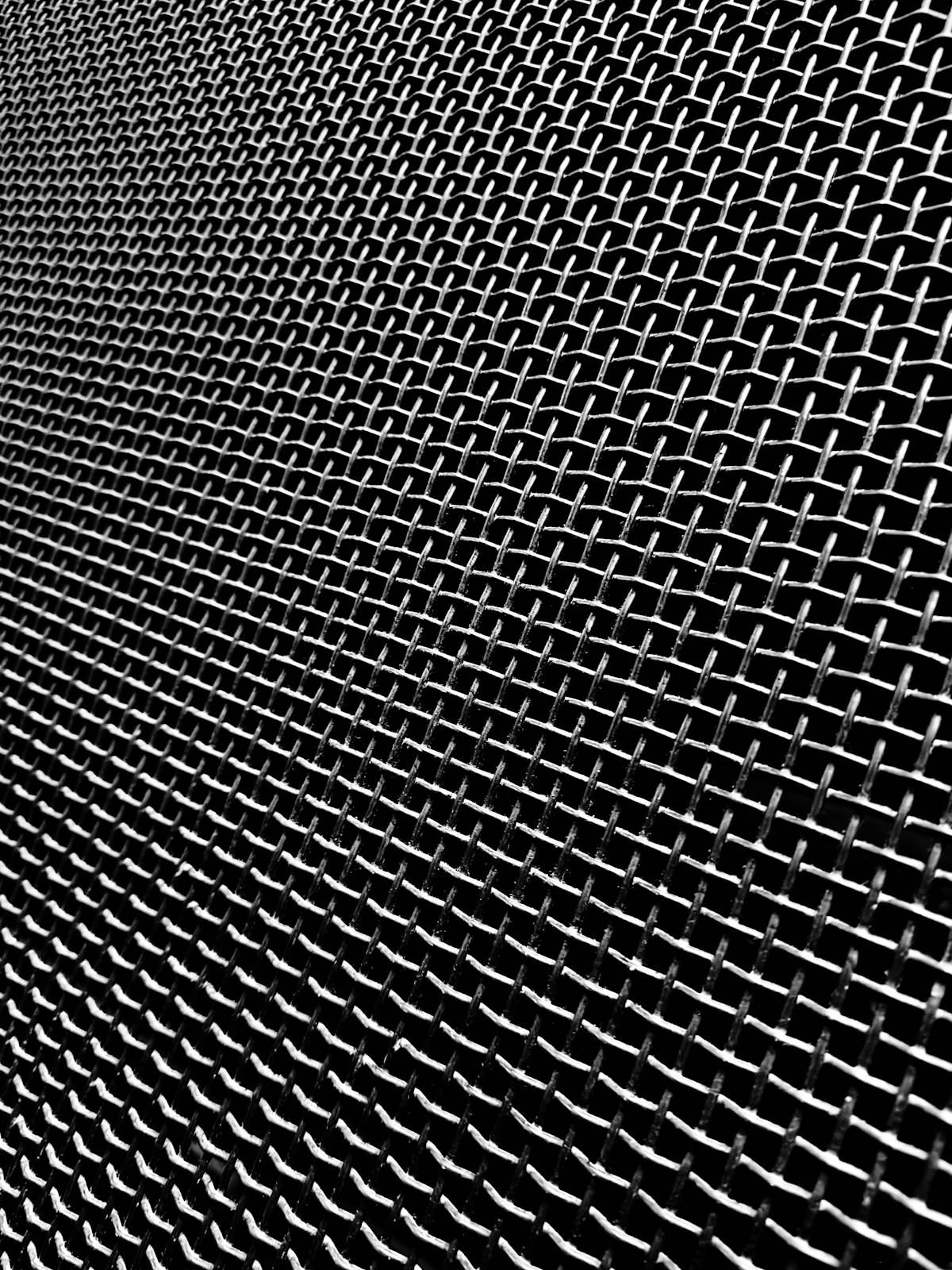 A close-up of fine micro-mesh screen material used in gutter guards